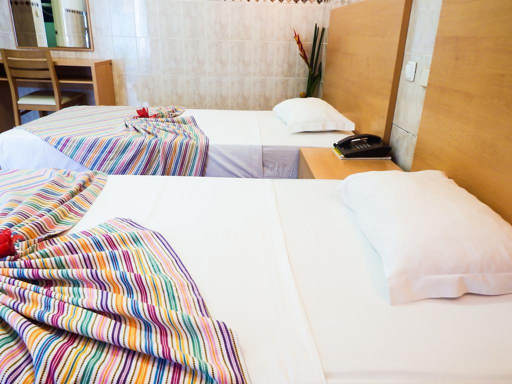 Hotel Avenida Sao Tome Quarto foto