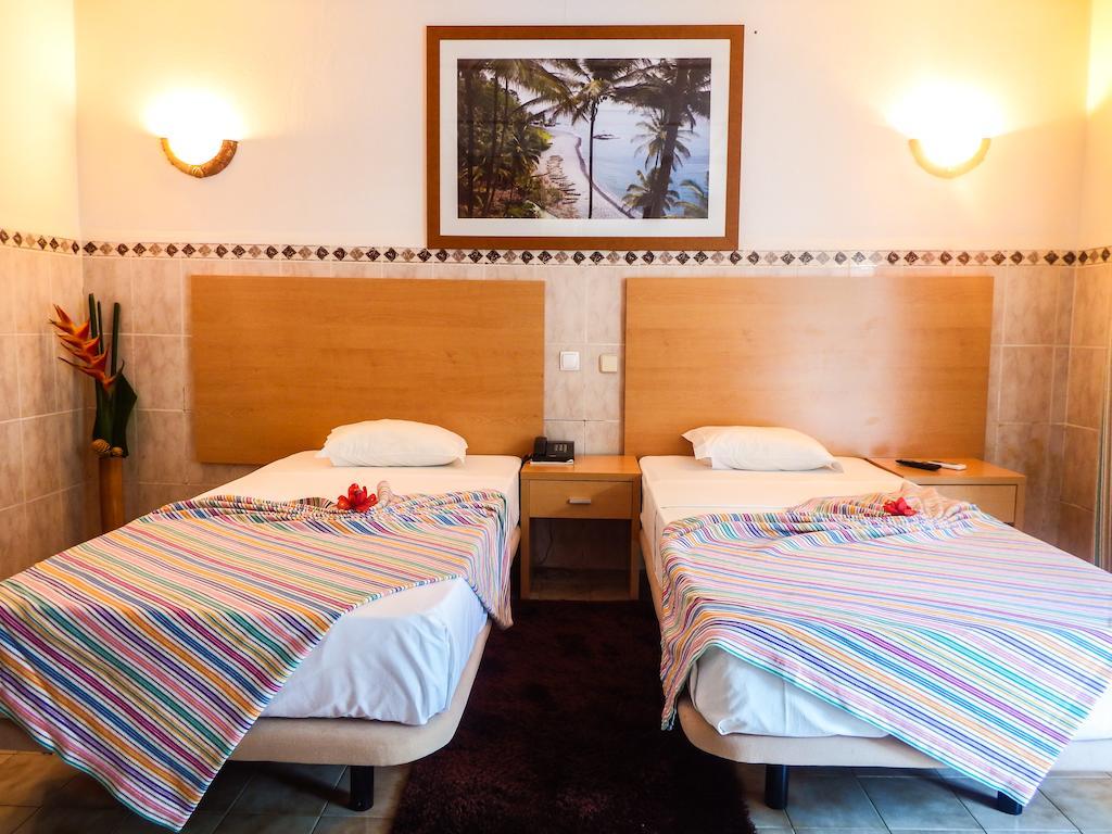 Hotel Avenida Sao Tome Quarto foto
